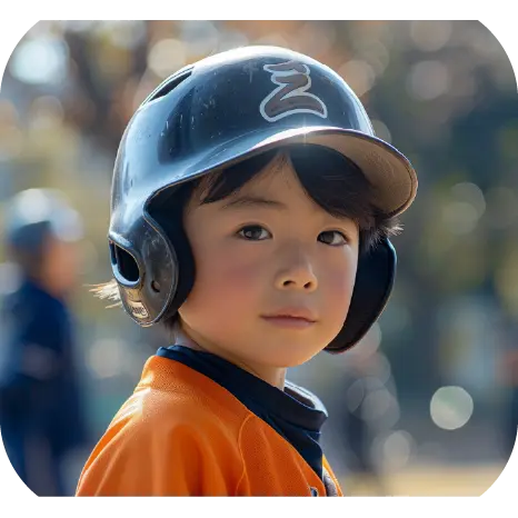 子供がベースボールをしている写真